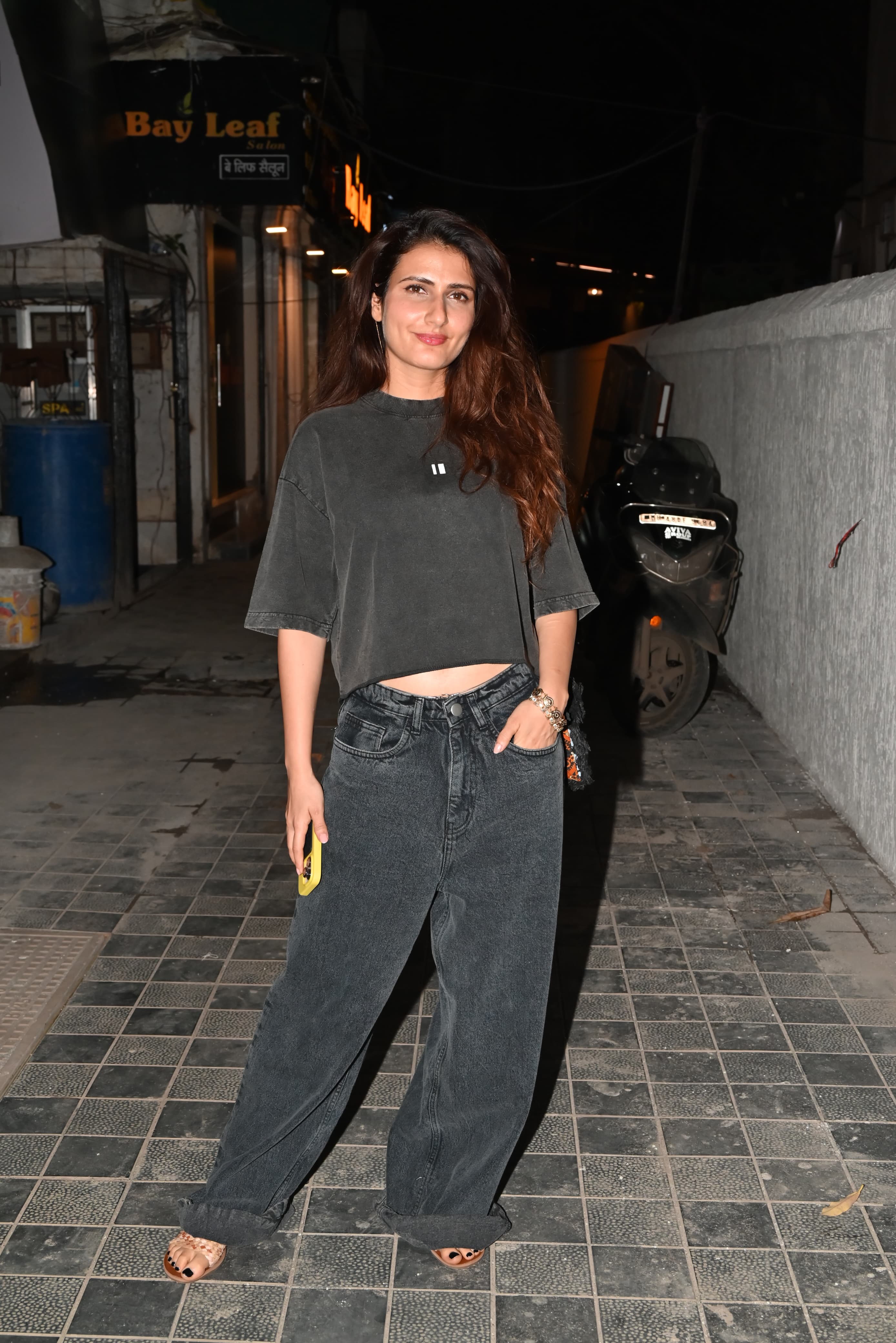 Metro In Dino girl, Fatima Sana Shaikh, was also spotted with Rhea at the restaurant in Bandra. She too kept it casual in a oversized cop tee and black straight jean.